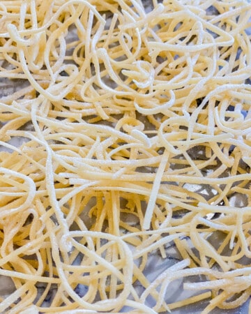 Dried spaghetti on a countertop.