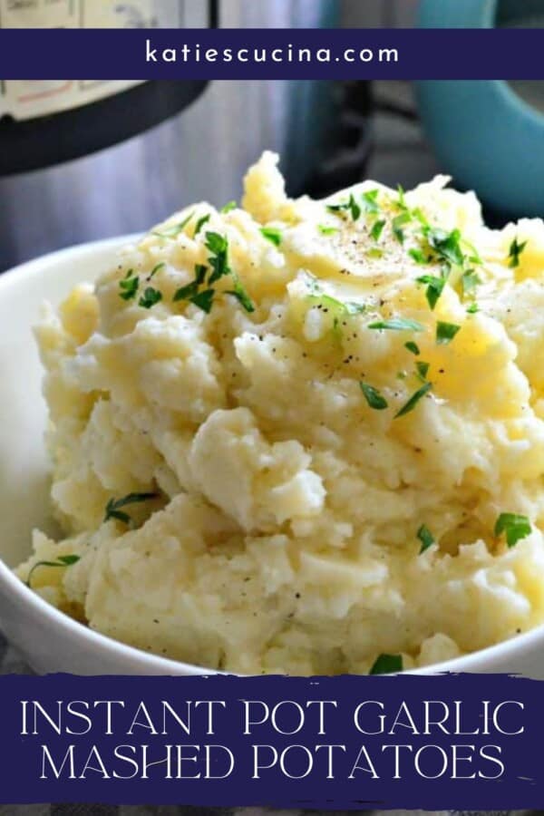 White bowl filled with mashed potatoes with parsley on top with text on image for Pinterest.