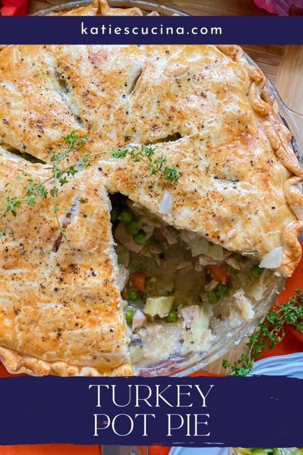 Glass pie plate filled with a turkey pot pie with a slice removed with recipe title text on image for Pinterest.