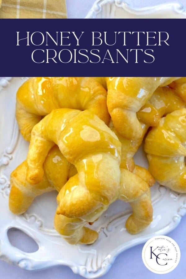 White platter with glazed baked croissants with recipe title text on image for Pinterest.