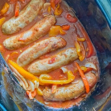 Photo taken from a vertical top angle of the Italian Sausage and Peppers being cooked inside of an instant pot.