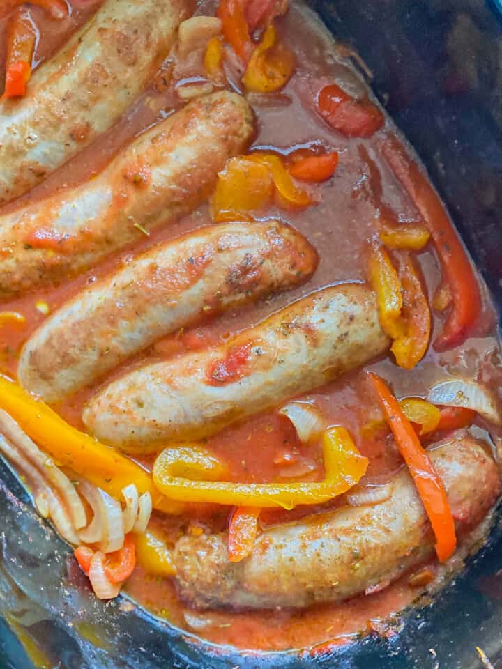 Photo taken from a vertical top angle of the Italian Sausage and Peppers being cooked inside of an instant pot.