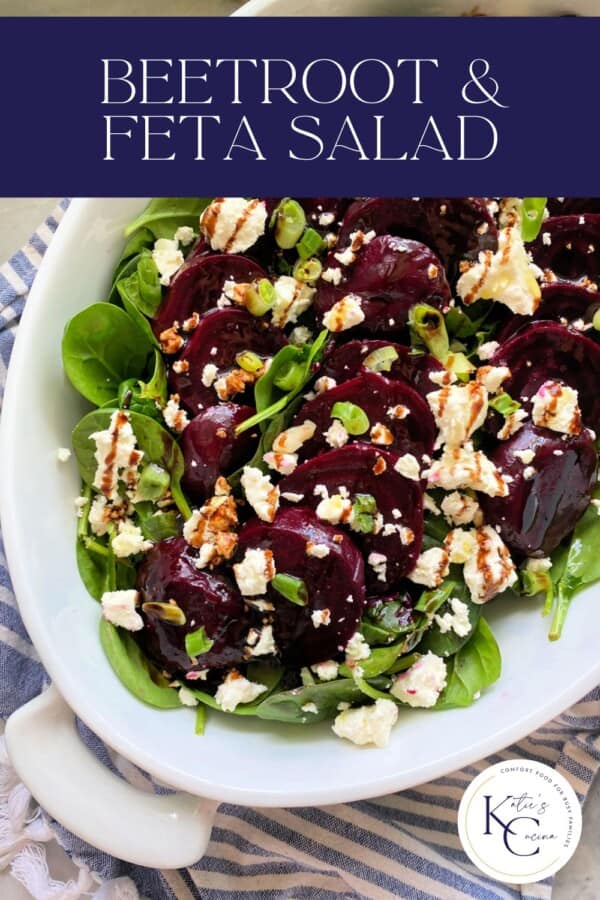 White bowl filled with beet salad with recipe title text on image for Pinterest.