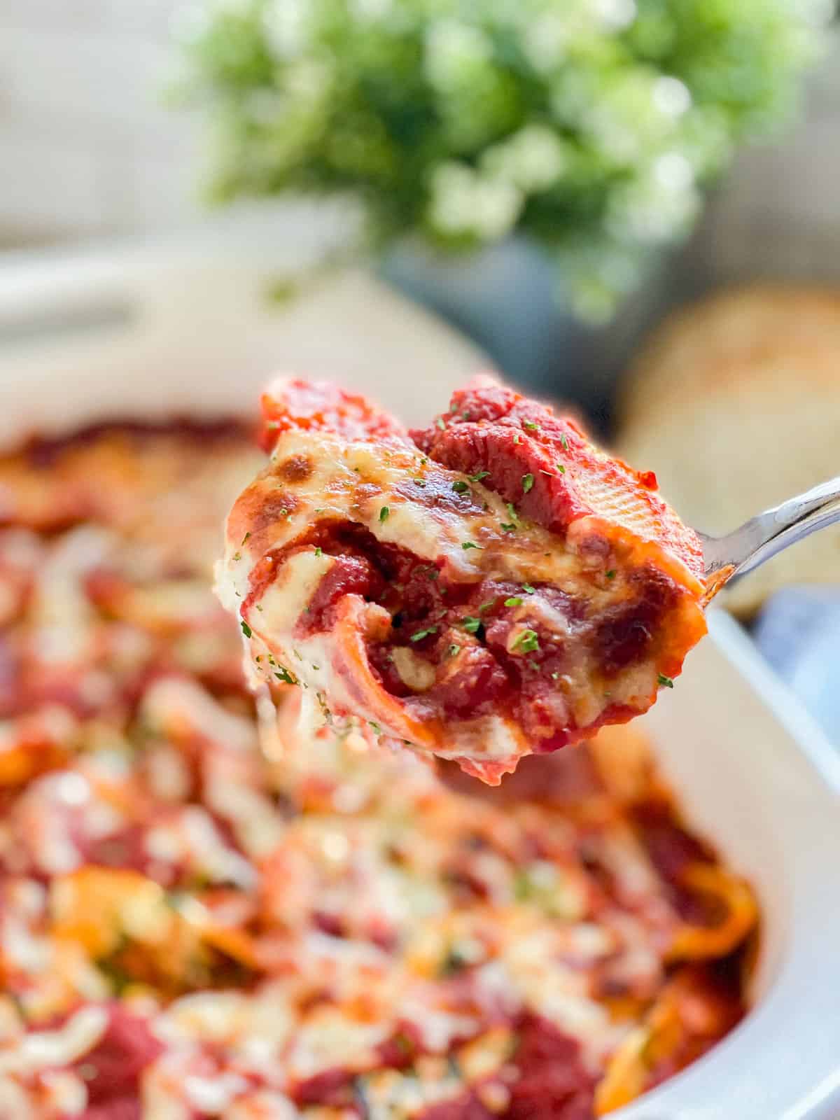 Up close spoonful of the Spinach Stuffed Shells.