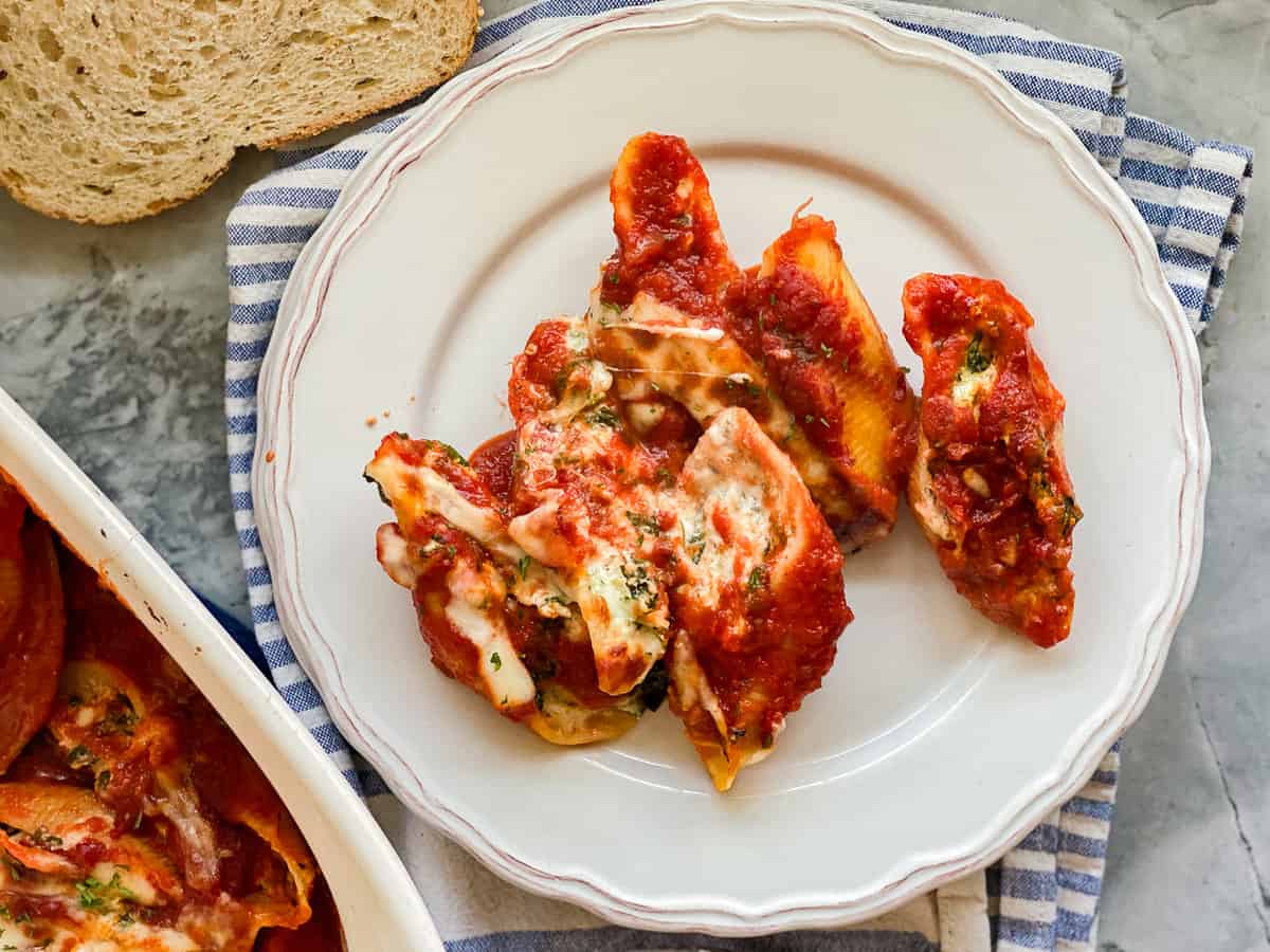 Photo taken from a top angle of the Spinach Stuffed Shells on a plate.