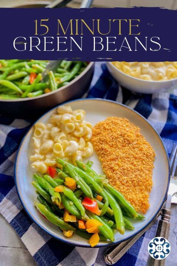 Cooked green beans served on a plate with pasta and chicken., with more green beans and pasta in the background, with the title "15 Minute Green Beans" at the top.