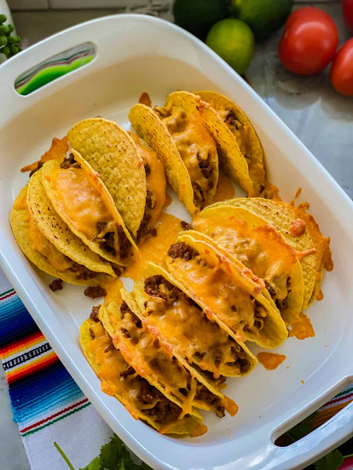 Beef Tacos resting on a baking dish.