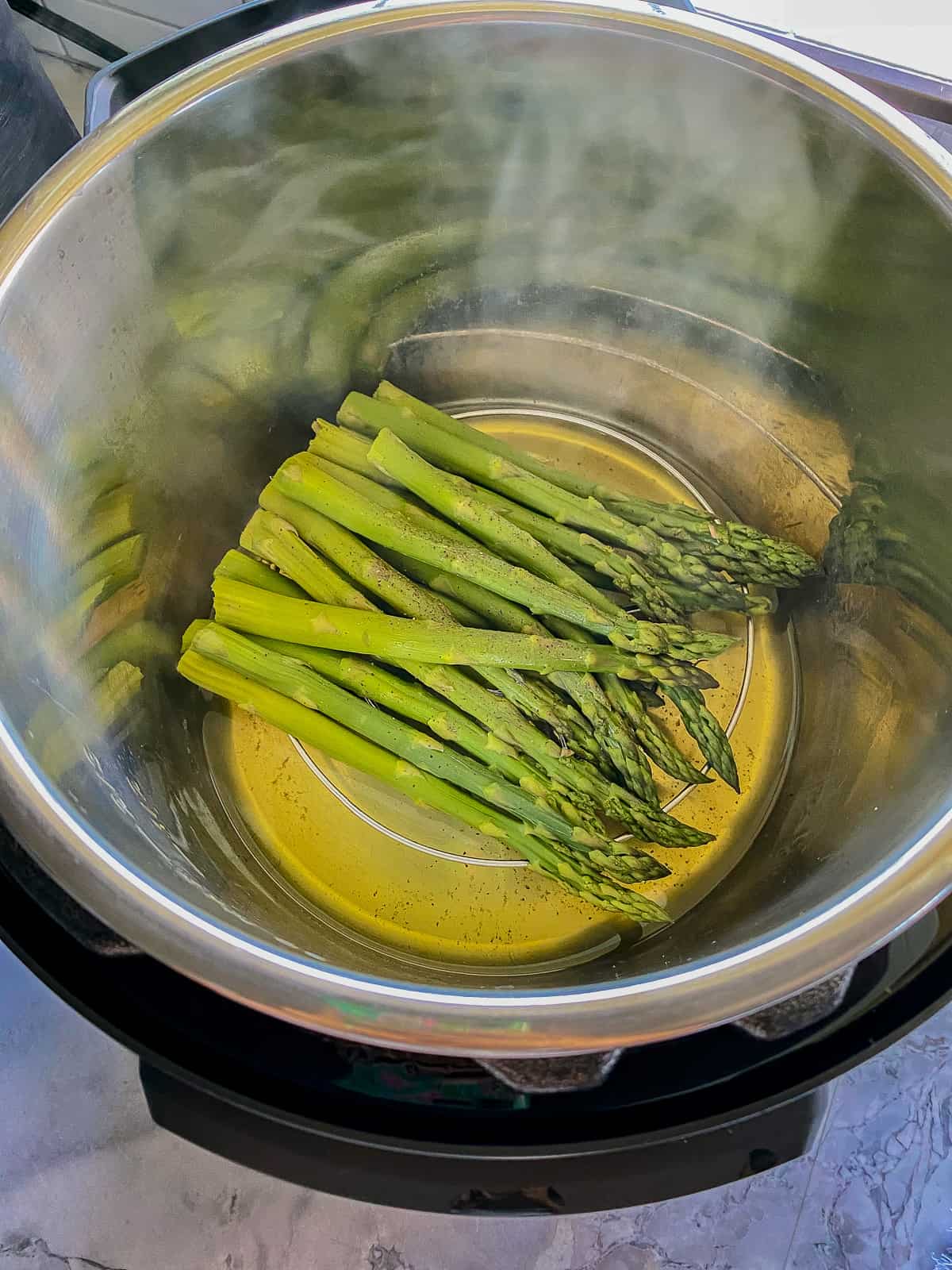 Asparagus cooking in the Instant pot.