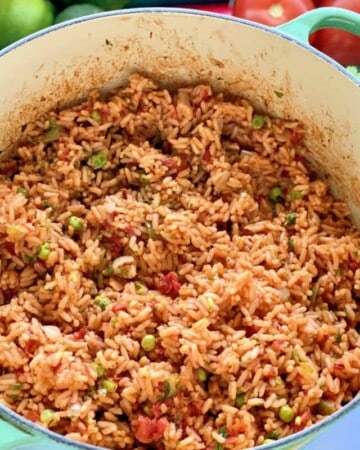 Green pot with rice inside of it.