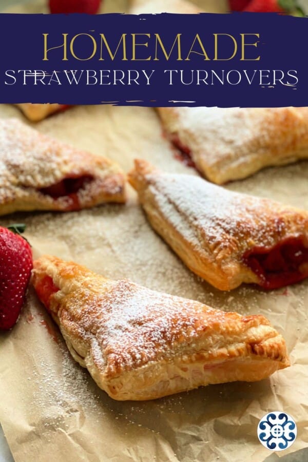 Triangle turnovers with powdered sugar on brown paper with text on image for Pinterest.