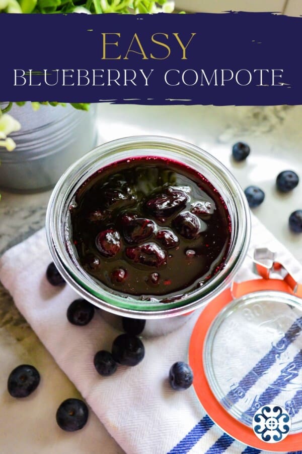 Glass jar filled with blueberry sauce with recippe title text on image for pinterest.
