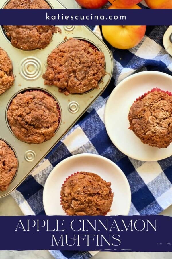 Text on image: "Apple cinnamon muffins" with photo of 2 apple cinnamon muffins on a small white plates on a blue and white checkered cloth, and 5 muffins.