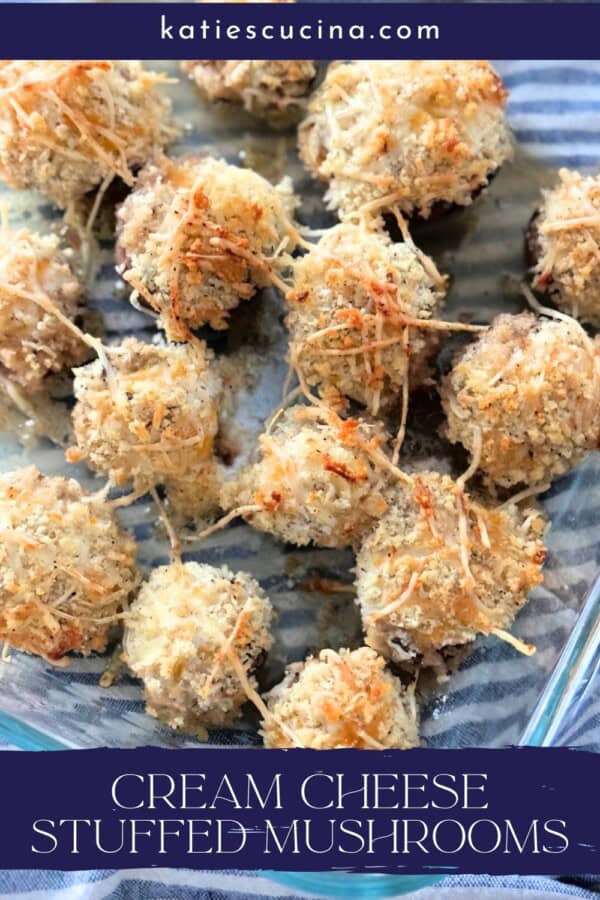 Glass dish filled with stuffed mushrooms with crumb topping with text on image for Pinterest.