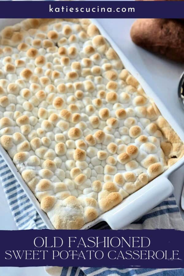 White rectangular baking dish filled with toasted marshmallow casserole with recipe title text on image for Pinterest.