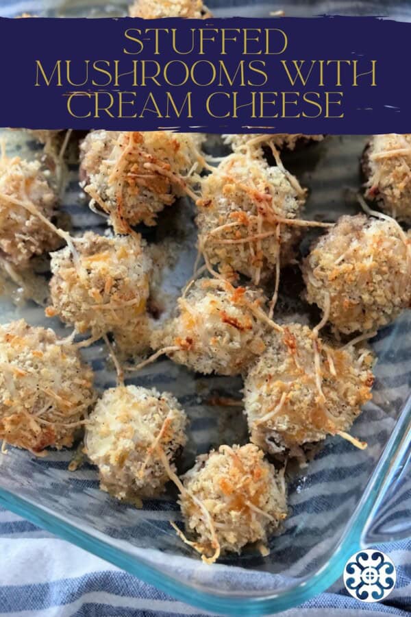 Glass dish filled with baked stuffed mushrooms with text on image for Pinterest.
