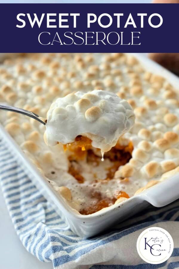 Spoon holding up a scoop of sweet potato casserole with toasted marshmallows with recipe title text on image for Pinterest.