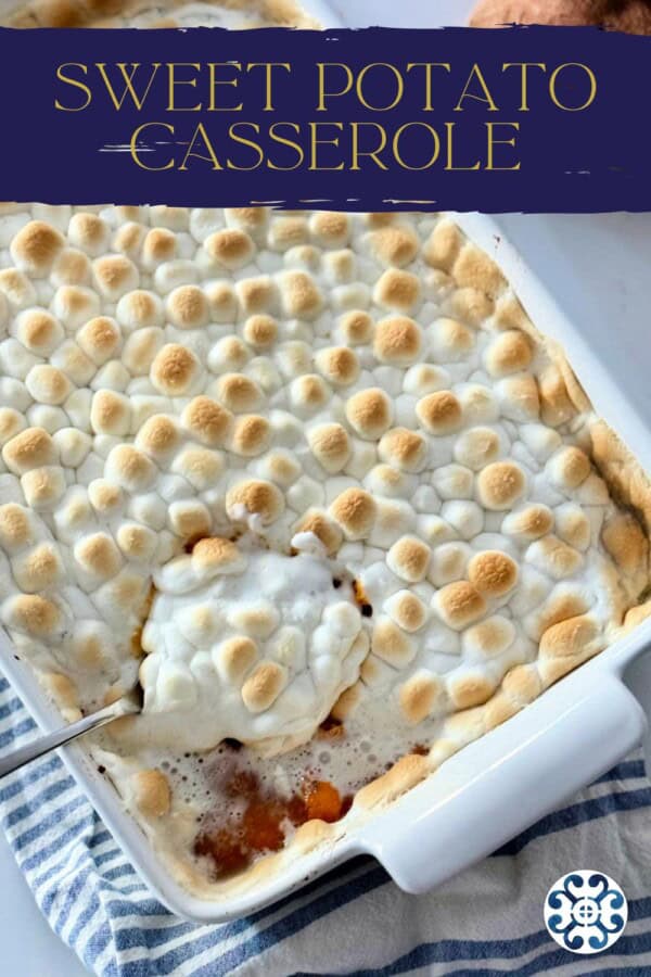 Spoon in a sweet potato casserole with toasted marshmallows with recipe title text on image for Pinterest.