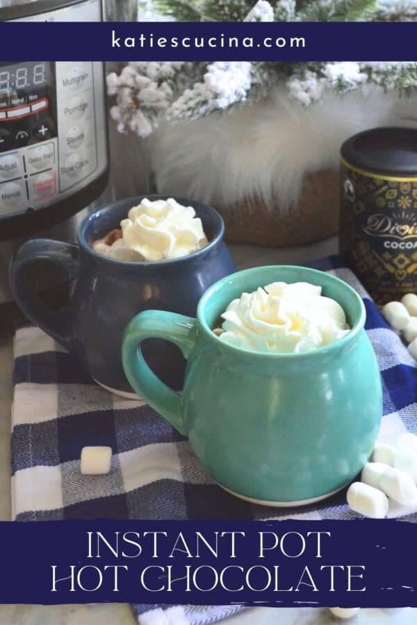 Two mugs with whipped cream with text on image for Pinterest.