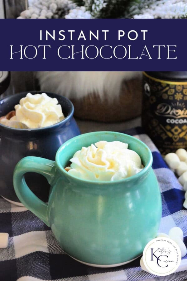 Light blue mug with whipped cream on a checkered cloth with text on image for Pinterest.