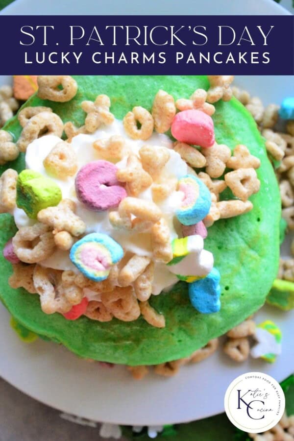 Green pancakes topped with whipped cream and Lucky Charm's cereal with text on image for Pinterest.