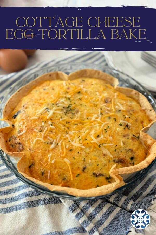 Glass baking dish filled with a baked tortilla on a white and blue cloth with text on image for Pinterest.