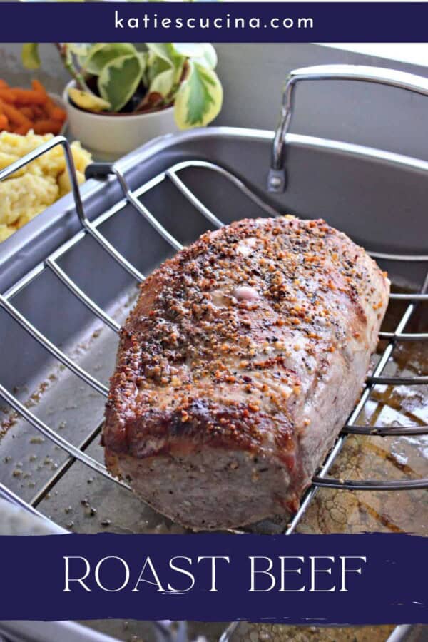 Roasting rack filled with a golden brown roasted piece of beef with text on image for Pinterest.