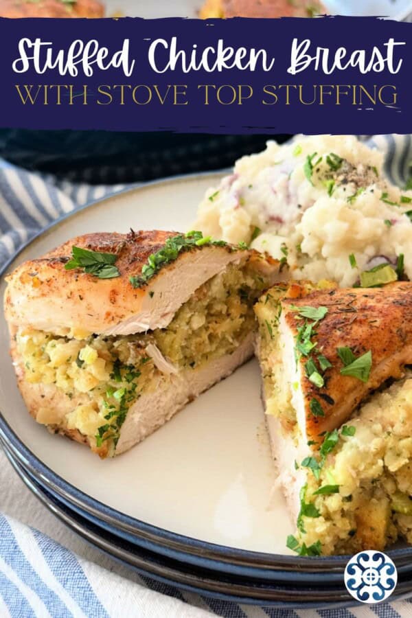 Two plates stacked with a chicken breast cut in half and stuffed with stuffing with text on image for Pinterest.