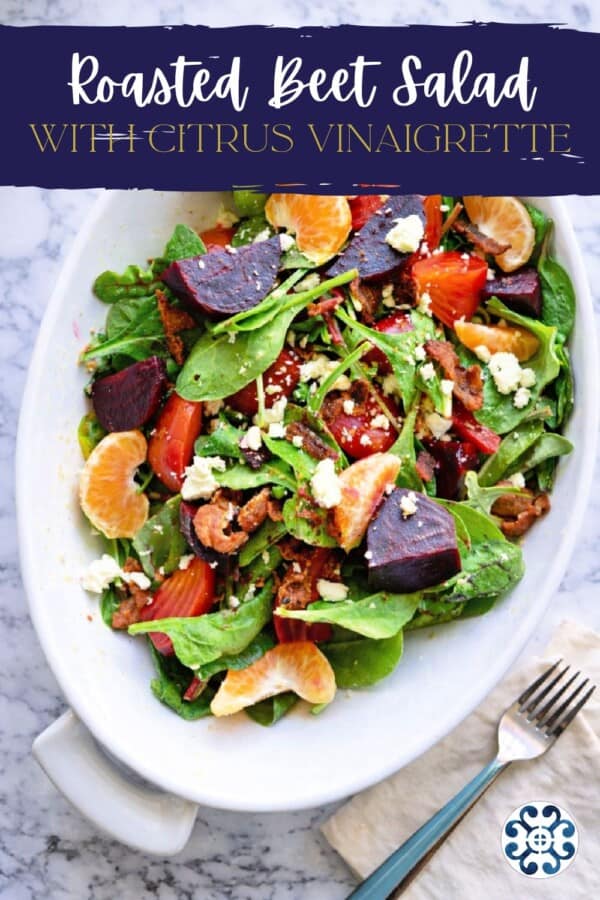 White oval serving dish filled with mixed greens, beets, citrus wedges and bacon with text on image for Pinterest.